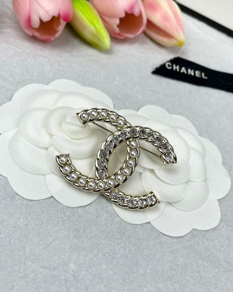 Ch**el brooches